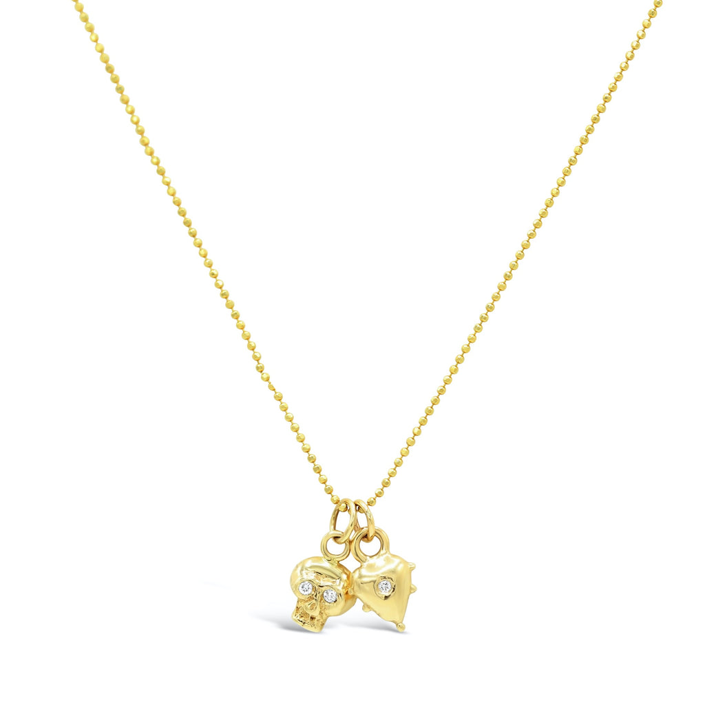 Diamond Baby Puff heart and Diamond eyed Skull necklace